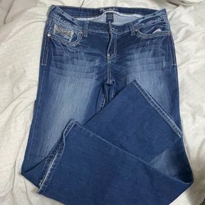 Bootcut jeans with bedazzled pockets